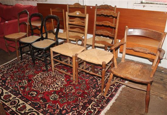 Victorian kitchen elbow chair, a pair of black lacquer chairs, four ladderback chairs and one other